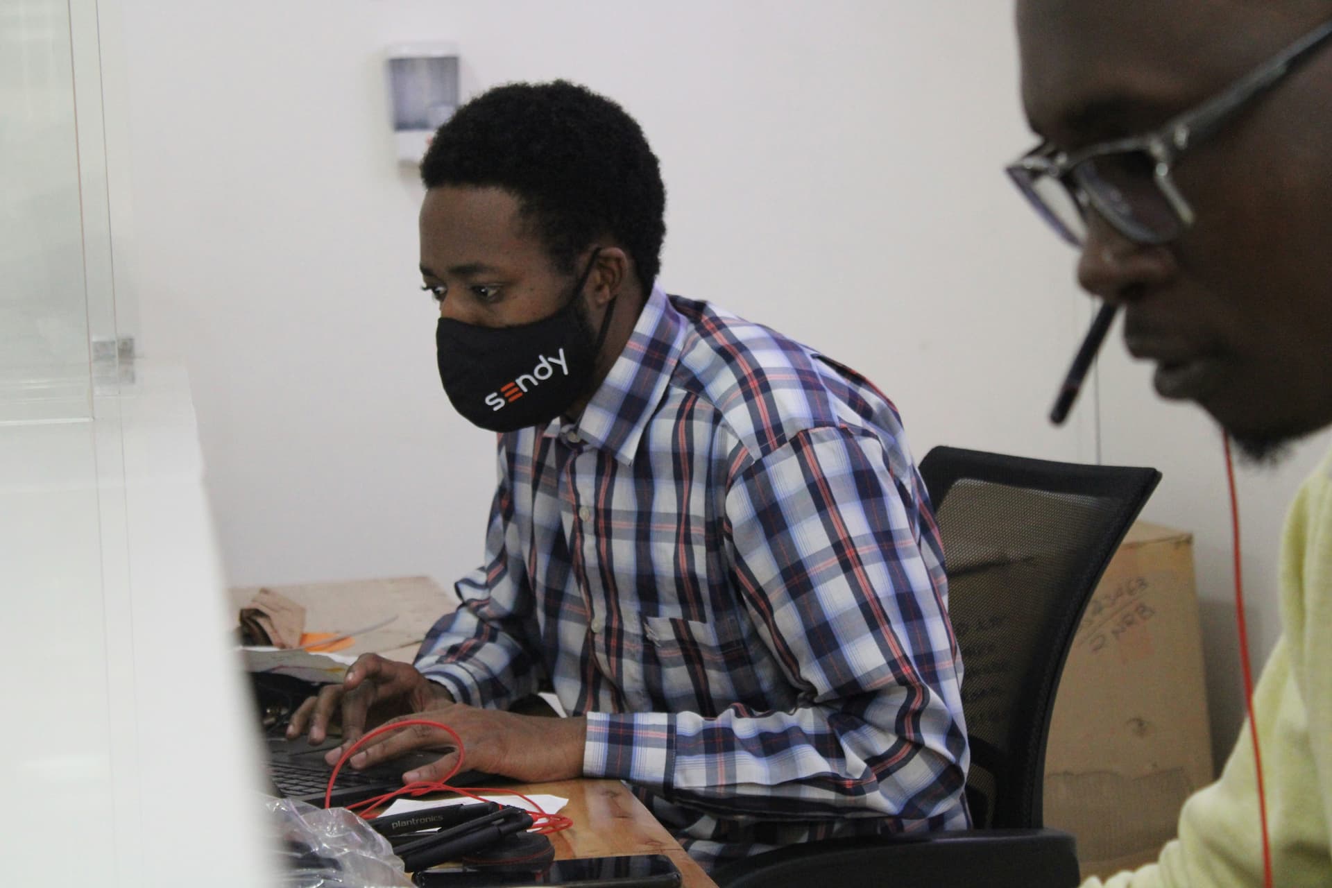 Modern Nigerian professionals at work
